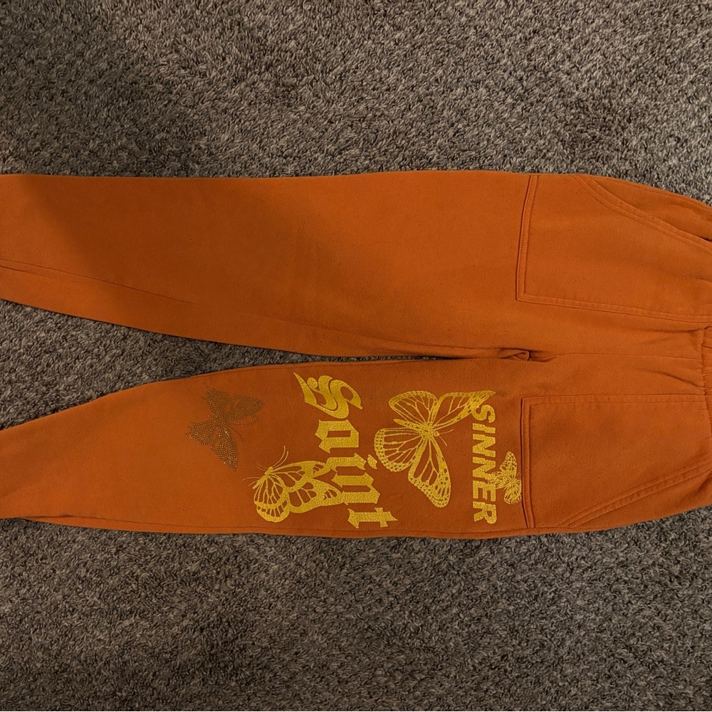 Sinn Orange Sweatpants with Yellow Butterfly Design